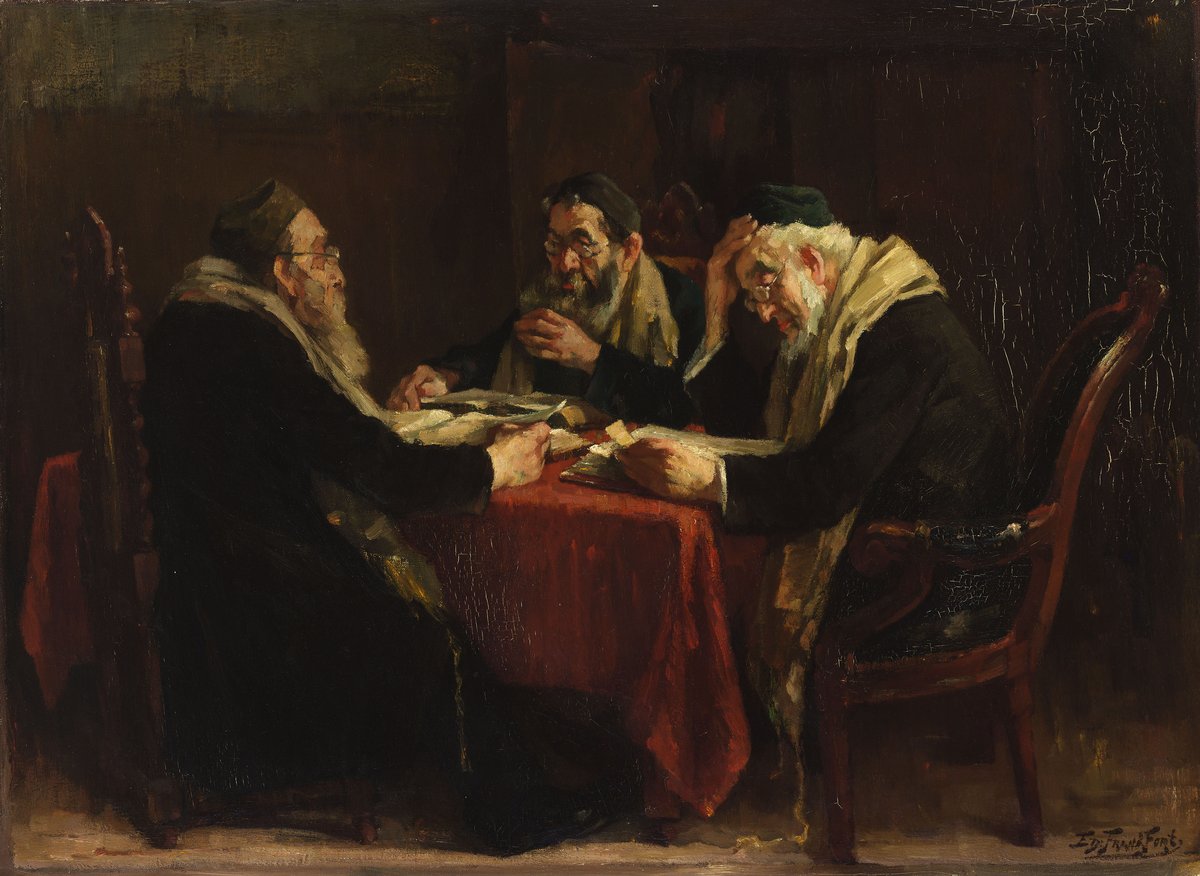 Rabbis studying a page of the Talmud together